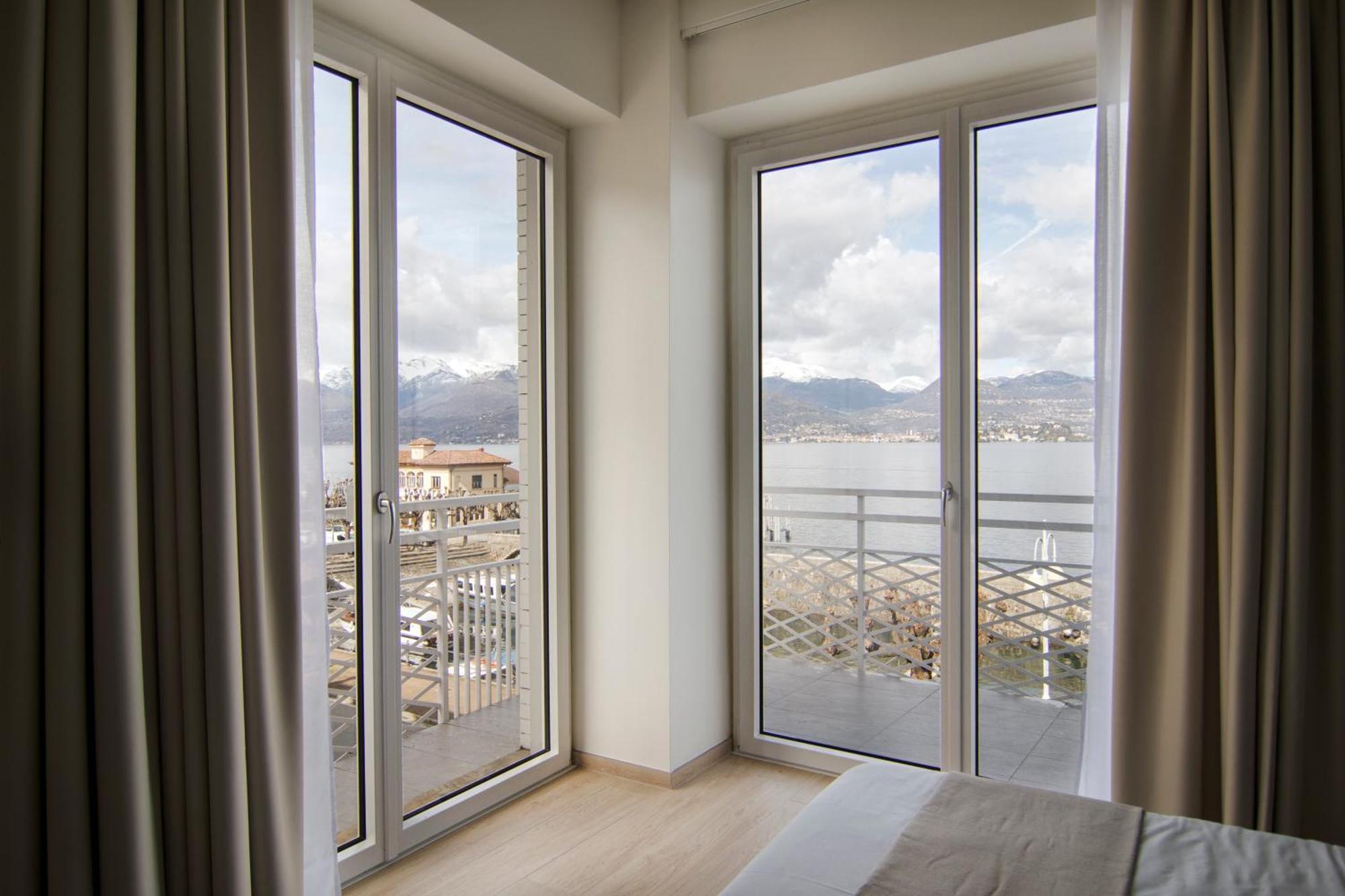 Gigi Suites&Apartments สเตรซา ภายนอก รูปภาพ